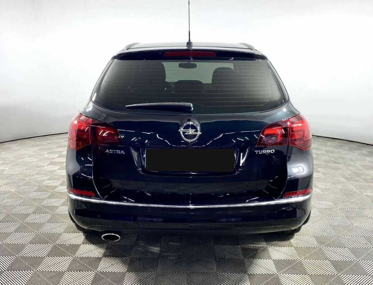 Б/У Опель Астра 2013 года. Фото: #5