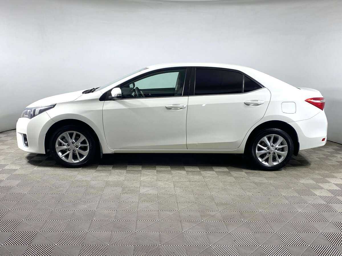 Б/У Тойота Королла 2013 года. Фото: #7