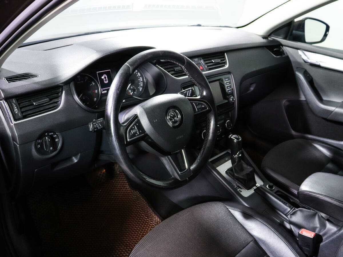 Б/У Шкода Октавия 2013 года. Фото: #11