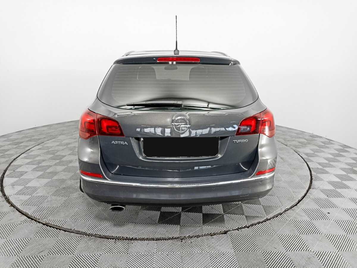 Б/У Опель Астра 2013 года. Фото: #5