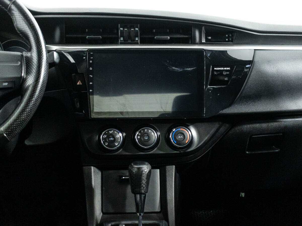 Б/У Тойота Королла 2013 года. Фото: #13