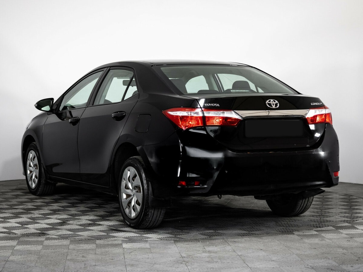 Б/У Тойота Королла 2014 года. Фото: #4