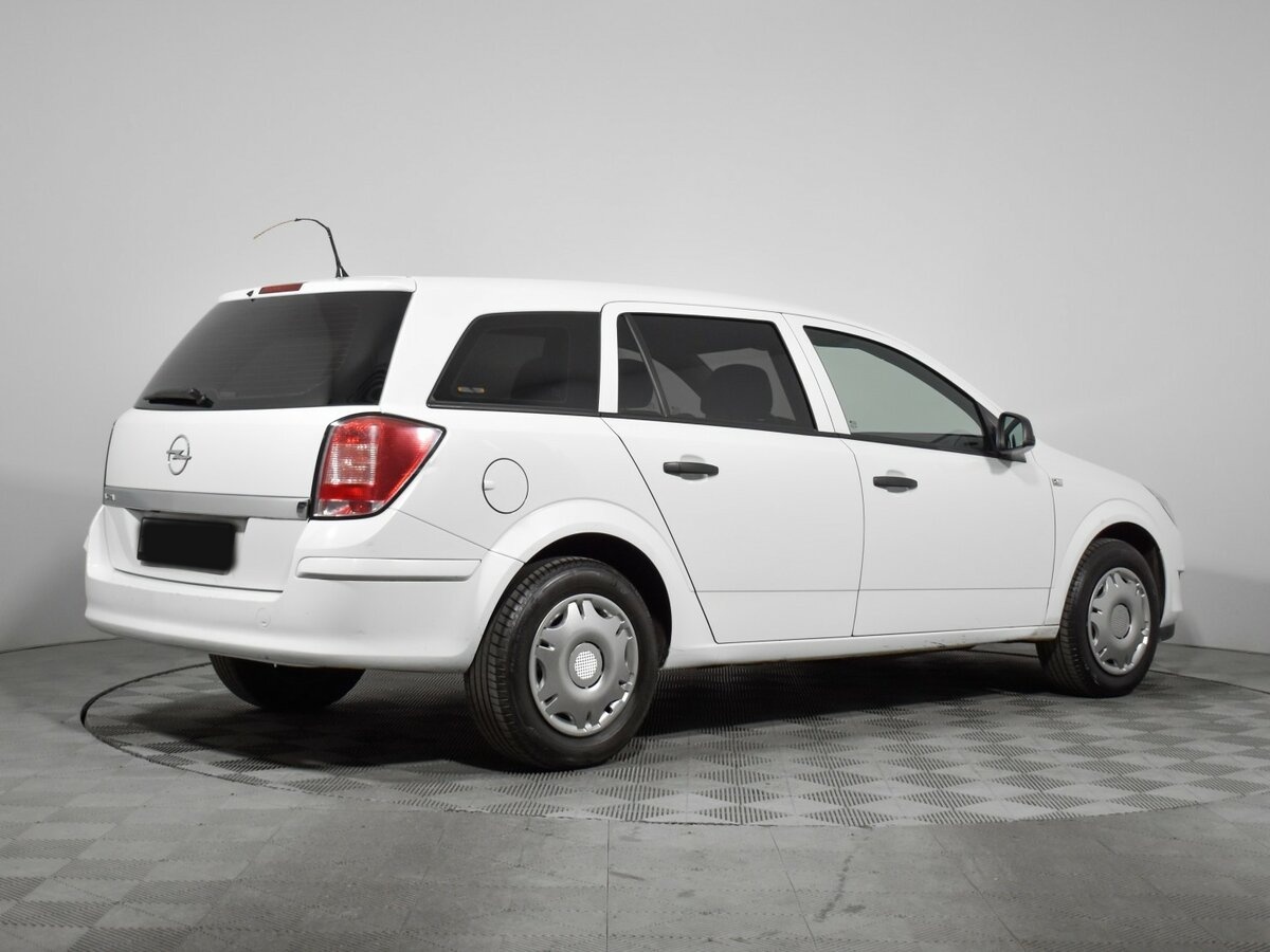 Б/У Опель Астра 2013 года. Фото: #4