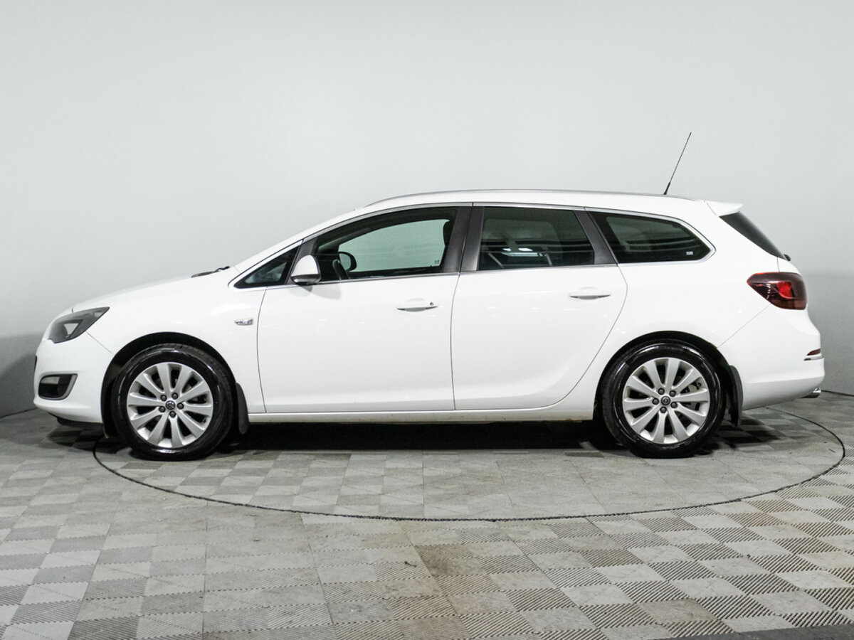 Б/У Опель Астра 2014 года. Фото: #7